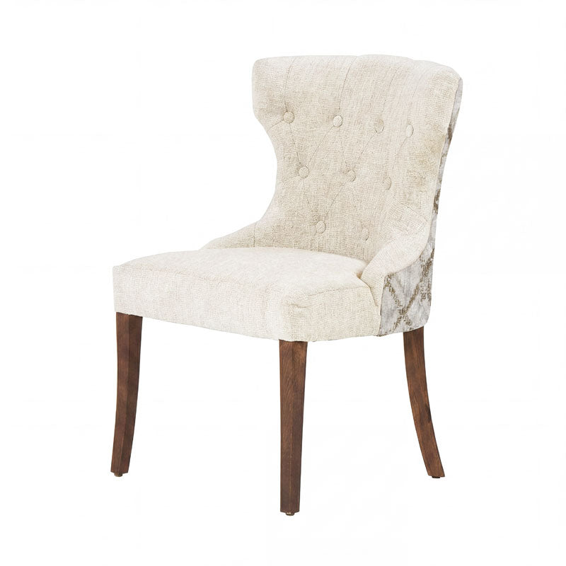 Sillón Tulip deoupe, asiento y respaldo acolchados con patas de metal, estilo moderno y elegante en color blanco.