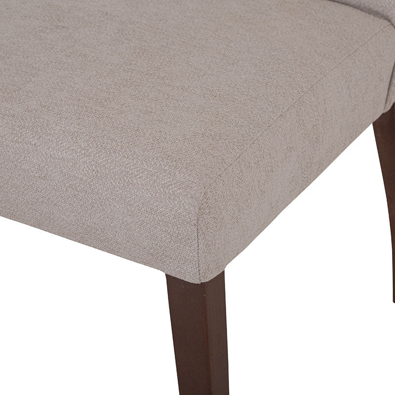 Silla de comedor Ikaro de deurope.com.mx, con diseño moderno y respaldo ergonómico en color gris claro.