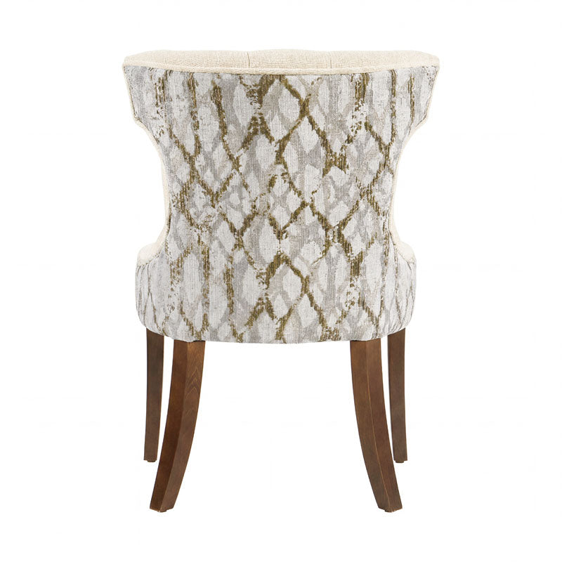 Sillón Tulip deoupe.com.mx en color blanco, con diseño moderno y patas de metal, asiento acolchado y respaldo curvado.