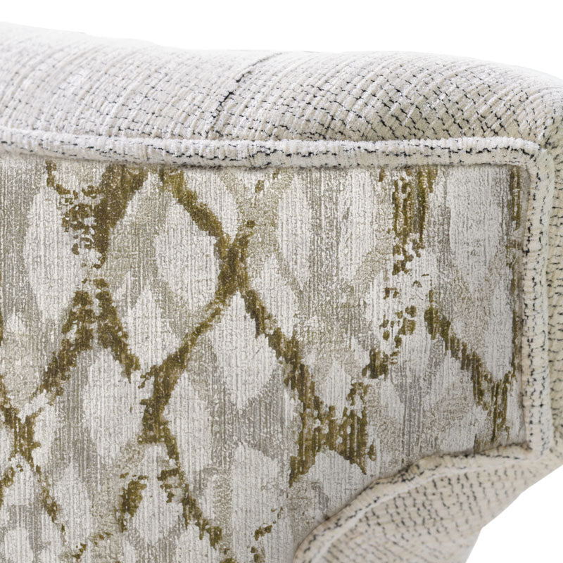 Sillón Tulip de deurope.com.mx con asiento y respaldo tapizados en tela blanca y base de pata metálica negra.