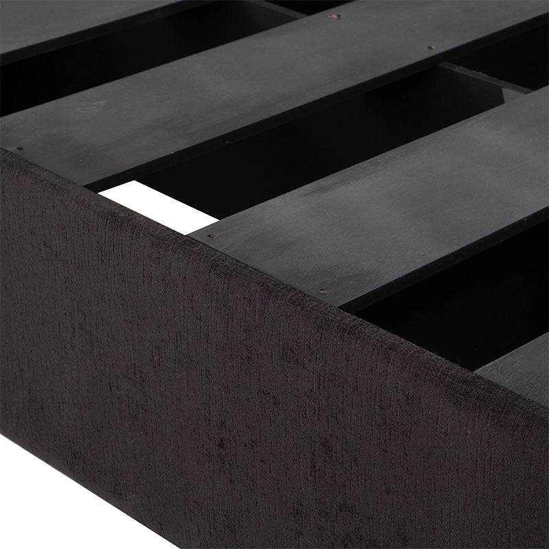 Base de cama Lazy de color negro con estructura de madera de pino y tapiz de tela, de aproximadamente 190 cm de largo.