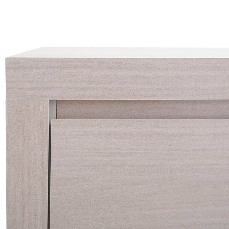 Buró Picasso decolor gris claro de madera industrializada, con superficie plana y diseño moderno, de aproximadamente 60 cm de ancho.