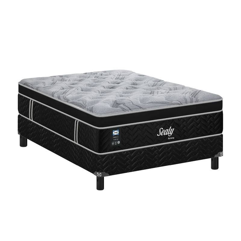 Juego de colchón y box matrimonial Sealy Arona, con estructura resistente y superficie cómoda para un descanso reparador.