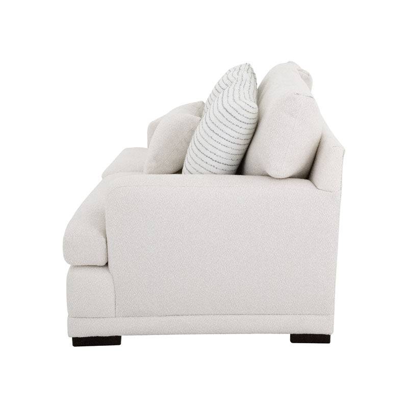 Sofá loveseat Oliver de deurope.com.mx con cojines acolchados y estructura de madera en color gris claro.