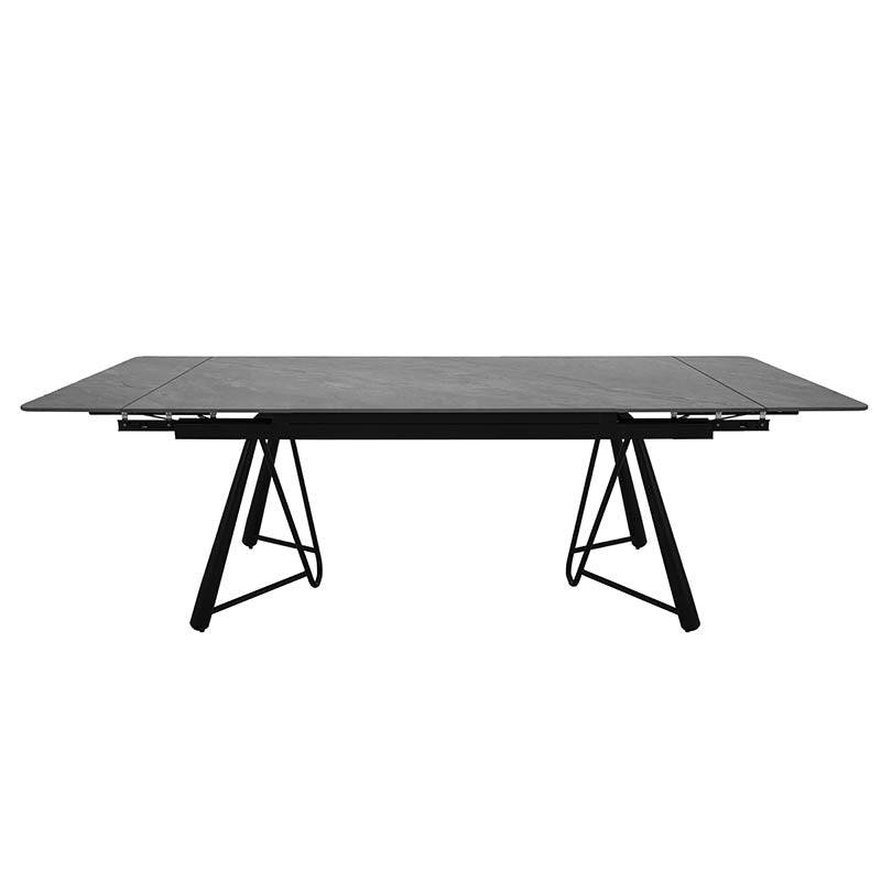 Mesa de comedor gris oscuro extensible de cerámica y base metálica, con extensión Yad, vista frontal.