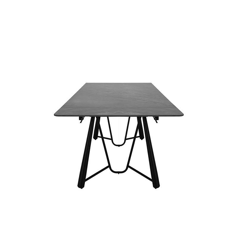 Mesa de comedor extensible Yad de deurope.com.mx, con superficie de cerámica gris oscuro y base metálica robusta.
