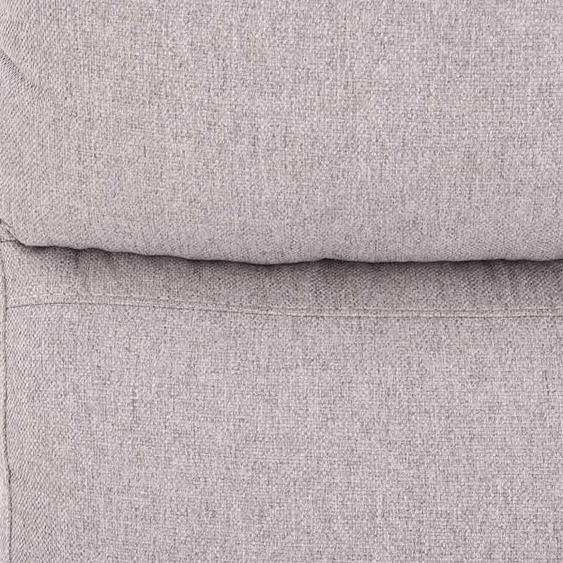 Sillón central del módulo de sala Pauda II decolor gris en tapiz de tela, con respaldo y asiento acolchados.