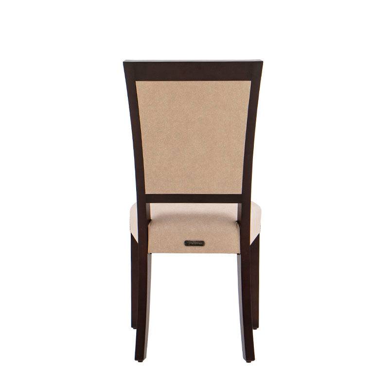 Juego de comedor Siena de 9 piezas con sillas de madera de banak y tapizado de cuero, mesas y sillas en tonos café y almendra.