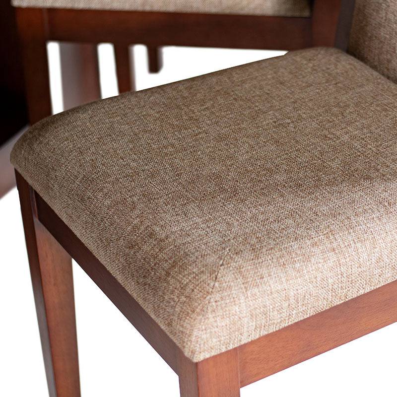 Juego de comedor Quetzal de 9 piezas con sillas tapizadas en tela, estructura de madera nogal y diseño elegante.