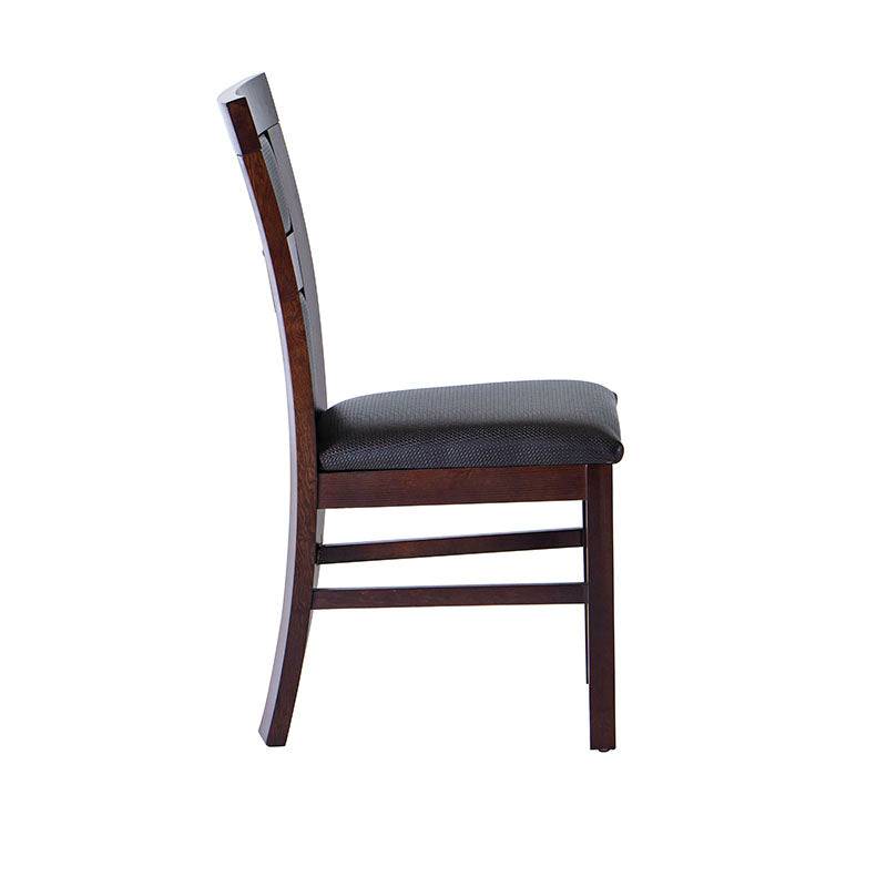 Conjunto de comedor Aragón de 8 piezas con sillas de nogal y madera, en un ambiente moderno con mesa y sillas visibles.