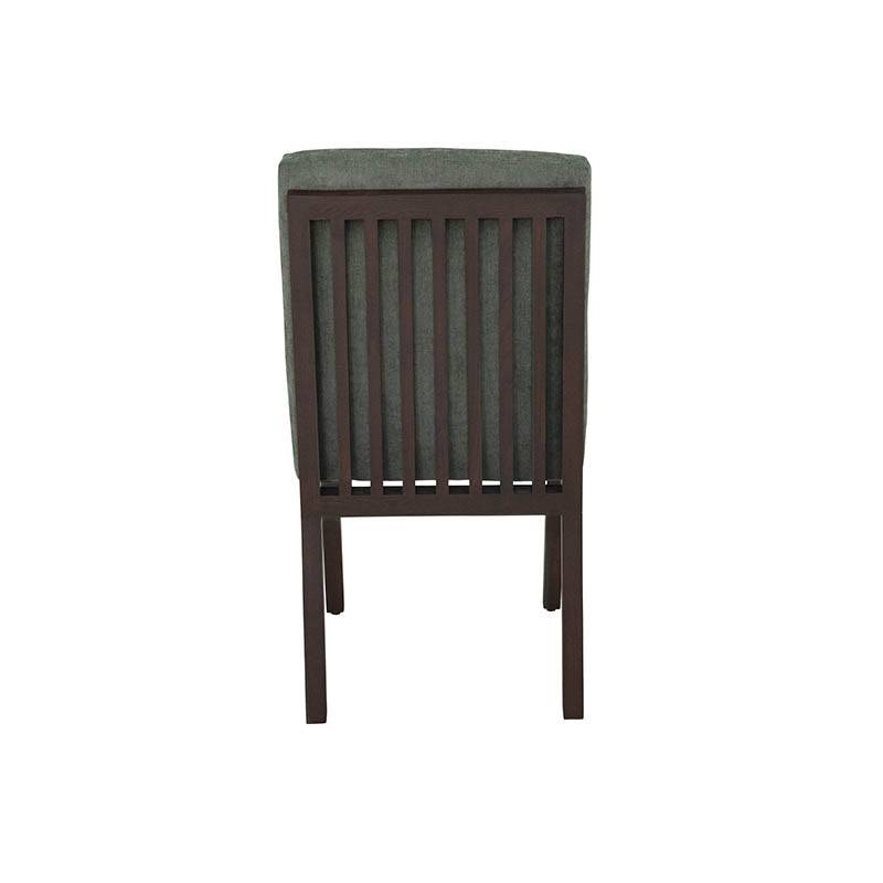 Silla verde Murcia para comedor, parte del juego de comedor Quetzal de 7 piezas, en un ambiente moderno.