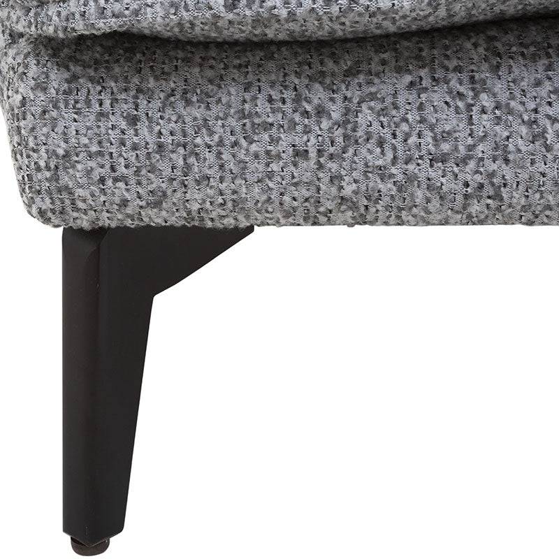 Sillón Andrea Berlin de color gris con tapiz de tela, vista frontal mostrando respaldo y asiento acolchado.